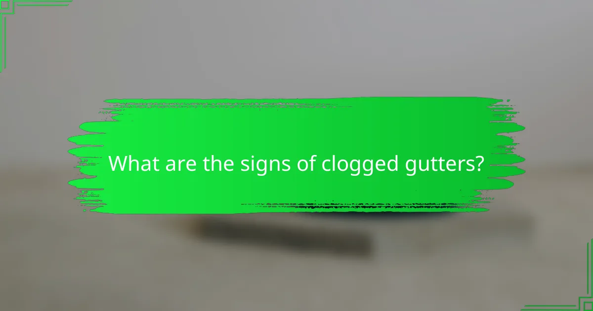 What are the signs of clogged gutters?